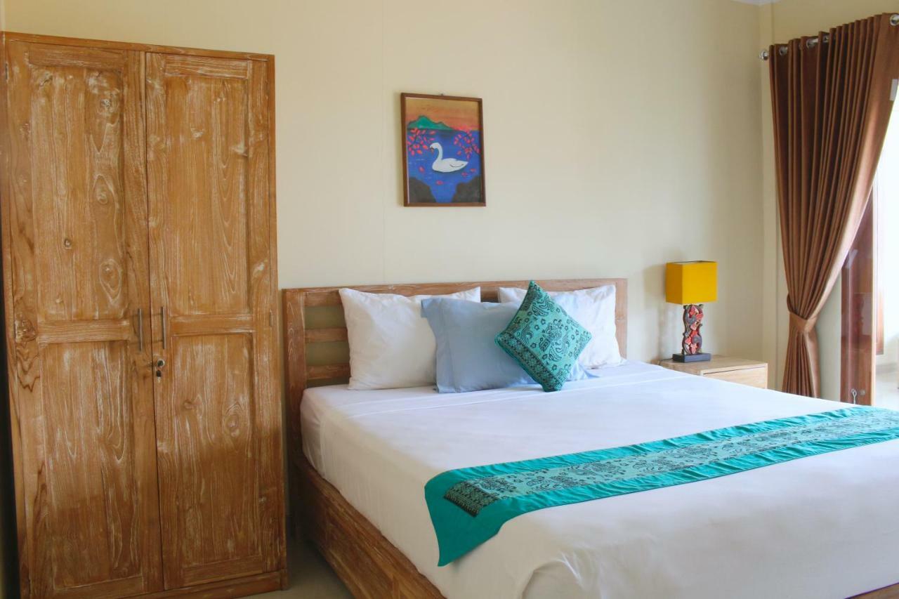 CR Tris Rooms Seminyak Bagian luar foto